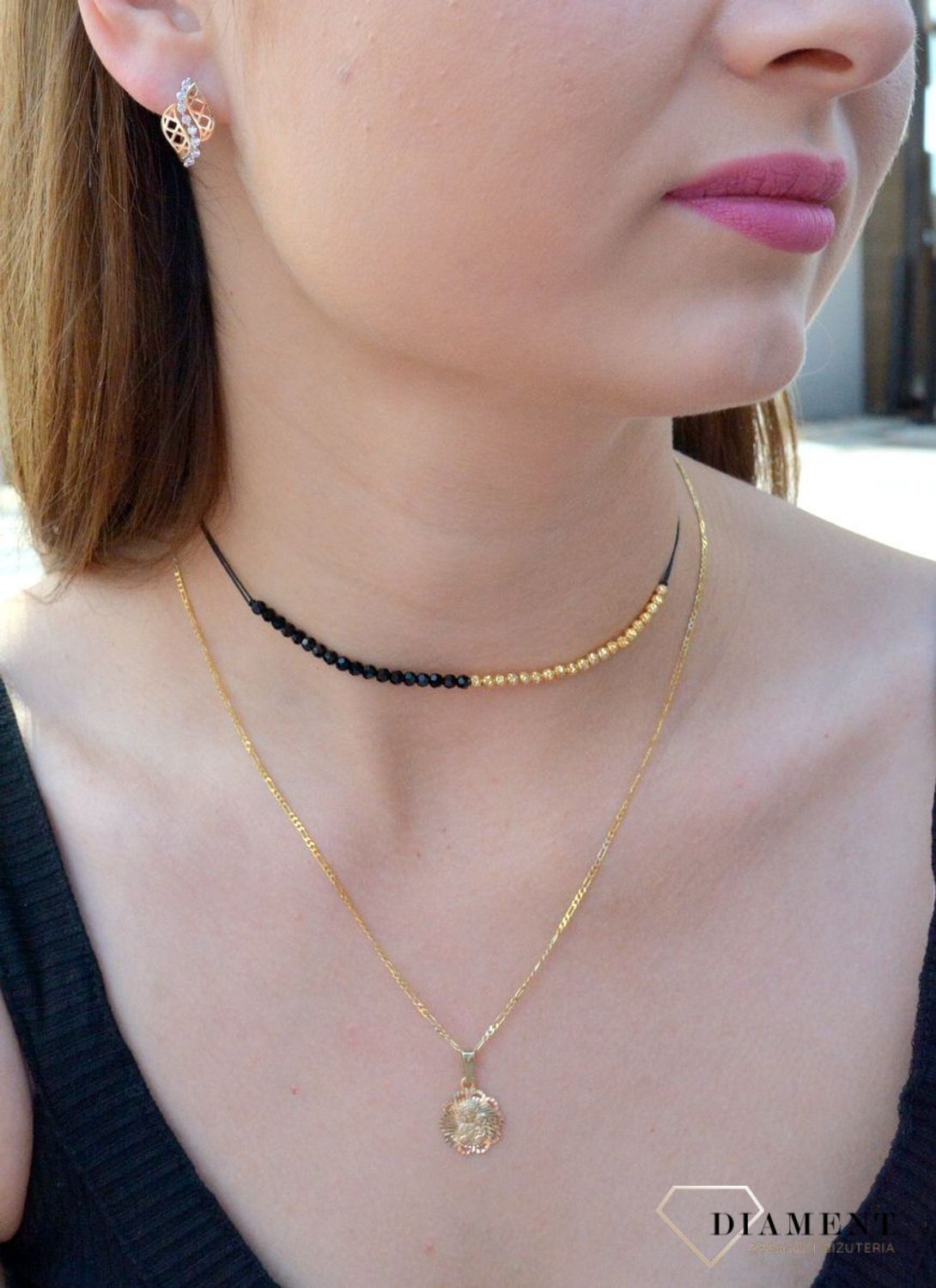 Złote kolczyki wiszące ażurowe listki próby 333 KL 6927 333. Złote kolczyki próby 333 o oryginalnym wyglądzie. Powstały z połączenia ażurkowych listków oraz cyrkonii. Niezwykle urokliwa ozdoba. Na prezent..jpg